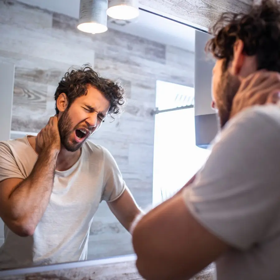 Man Struggling With Sleep Apnea