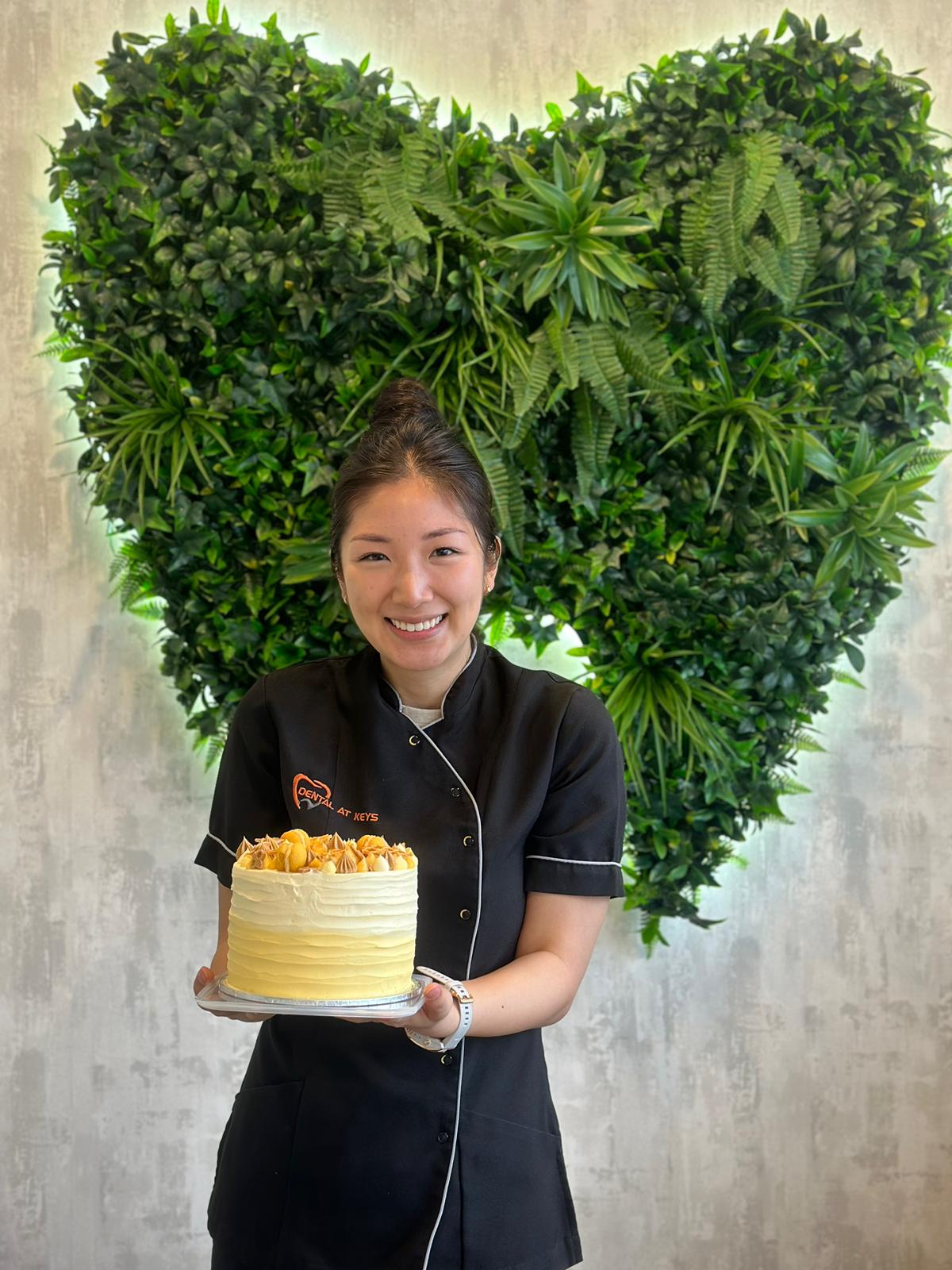 Dr Daniella Birthday 2024 Holding Cake