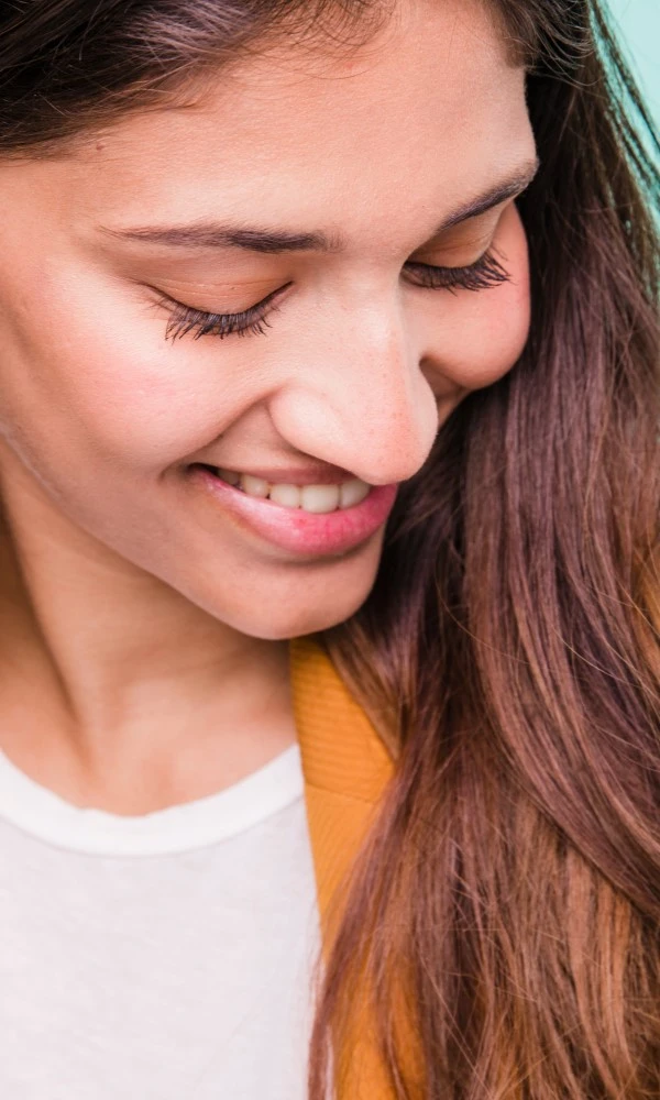 Smiling Lady Orange Jumper