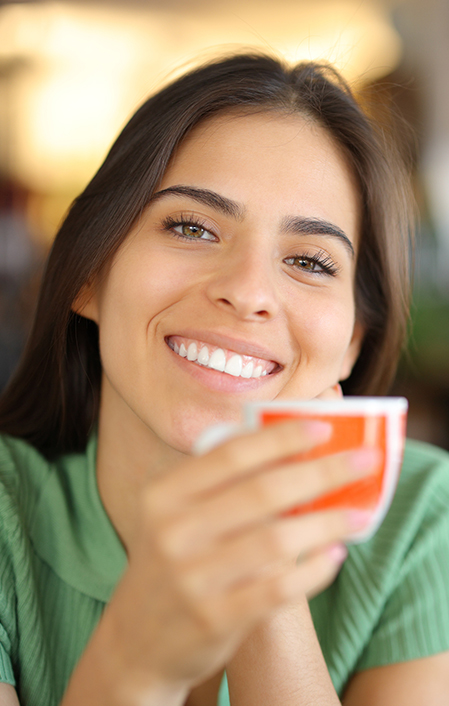 Happy Woman With Perfect Smile Drinking Coffee 2004785093 3869x2579